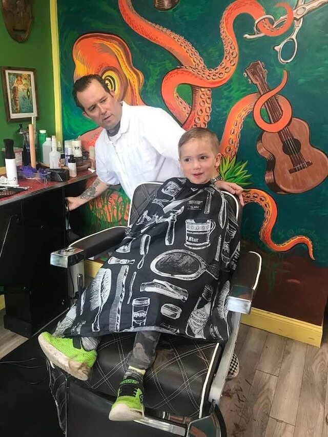 Kevin 'Jack' Patey cutting hair at Jack's Barber Shack in Manchester-by-the-Sea, MA